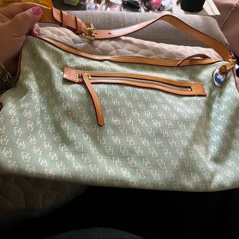 Authentic Dooney bag and wristlet great condition used only a couple times!